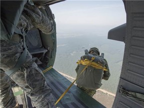 This photo shows Canadian soldiers during parachute training in 2014. Canadian Forces photo.