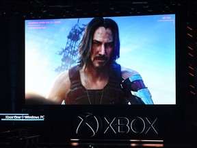 Canadian-US actor Keanu Reeves announces the new video game "Cyberpunk 2077" at the Microsoft Xbox press event ahead of the E3 gaming convention in Los Angeles on June 9, 2019.