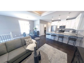 Panoramic view of the great room in the model home. Cierra Meadows Townhome Community in East Windsor is near a park, grocery stores, a walk-in medical clinic and other amenities.
