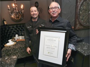 Joe Ciliberto, left, head chef and his father, Michael Ciliberto, owner of La Guardia Italian Cuisine in downtown Windsor are shown at the Pitt Street East restaurant on June 11, 2019. The family is celebrating 40 years in business.