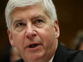 FILE PHOTO: Michigan Governor Rick Snyder testifies before a House Oversight and government Reform hearing  on "Examining Federal Administration of the Safe Drinking Water Act in Flint, Michigan, Part III" on Capitol Hill in Washington March 17, 2016. REUTERS/Kevin Lamarque/File Photo