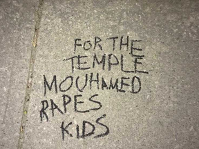 An offensive message scrawled on the sidewalk outside the London Muslim Mosque.