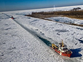 CCGS Samuel Risley is shown in this photo, provided by the Canadian Coast Guard, clearing a path in the ice in the St. Clair River this past winter. The federal government says it will spend $15.7 billion to renew the coast guard's aging fleet.