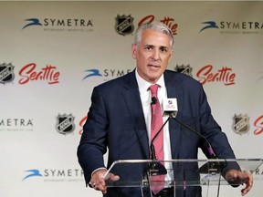 Ron Francis speaks to reporters Thursday in Seattle after he was introduced as the first general manager for Seattle's yet-to-be-named NHL hockey expansion team. Ted S. Warren/AP