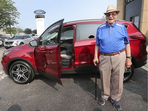 Hitting 100 and ready to hit the road with a fresh set of wheels. Windsor's Earl Wilson, 100, poses next to his new 2019 Ford Escape on July 8, 2019, at the Performance Ford dealership in Windsor.