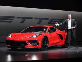 Mark Reuss, president of General Motors Company, unveils the 2020 mid-engine C8 Corvette Stingray during a news conference on July 18, 2019 in Tustin, California.