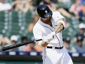 Nicholas Castellanos of the Detroit Tigers swings on his solo home run to defeat the Toronto Blue Jays 4-3 in the 10th inning at Comerica Park on July 21, 2019 in Detroit, Michigan.