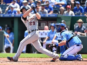 Gordon Beckham of the Detroit Tigers hits a two-run home run in the third inning against the Kansas City Royals at Kauffman Stadium on July 14, 2019 in Kansas City, Missouri.