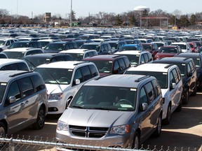 In this file photo, hundreds of Dodge Grand Caravans and Chrysler Pacificas manufactured by FCA Windsor Assembly Plant are shown March 27, 2019, parked on the old GM Transmission Plant property now operated by Motipark Automotive Storage.