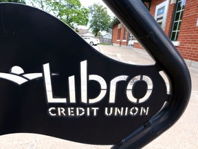 The sign at the Libro Credit Union branch in Woodslee slated for closure is shown June 11, 2019.