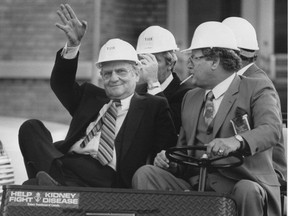 'He was an icon." Lee Iacocca and Windsor plant manager George Hohendorf tour the Windsor Assembly Plant on Sept. 15, 1983.