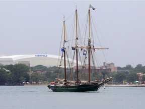 S V Denis Sullivan of Milwaukee,  Wisc., one of five tall ships motors up-bound on the Detroit River downtown Detroit and Ford Field Tuesday.