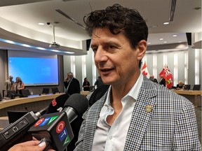 Amherstburg Mayor Aldo DiCarlo speaks to reporters following an Essex County Council meeting at the Essex County Civic Centre on Wednesday, July 17, 2019. He had been absent from meetings for three months due to an unidentified illness.