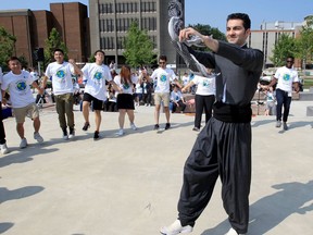 Celebrating World Student Day, University of Windsor business student Shahab Taheri performs a traditional Kurdish dance on July 26, 2019. He was joined by dozens of other international and local students during the festivities at the U of Windsor's Wilson Commons.
