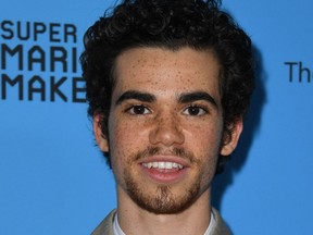 In this file photo taken on June 16, 2019, actor Cameron Boyce arrives for the 2019 ARDYs (aka Radio Disney Music Awards) at the CBS Radford Studios in Studio City, California. Boyce, 20, died July 6 from a seizure due to an ongoing medical condition.