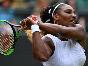 US player Serena Williams returns against Spain's Carla Suarez Navarro during their women's singles fourth round match on the seventh day of the 2019 Wimbledon Championships at The All England Lawn Tennis Club in Wimbledon, southwest London, July 8, 2019.