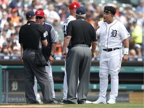 Detroit Tigers designated hitter Miguel Cabrera argues with umpire Joe West (22) after getting ejected from the game during the second inning against the Boston Red Sox at Comerica Park.