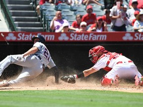 Detroit Tigers left fielder JaCoby Jones (21) scores a run at the top of the third against the Los Angeles Angels at Angel Stadium of Anaheim.
