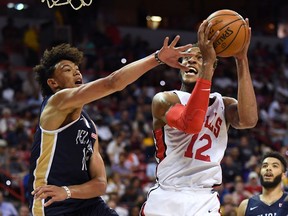 Chicago Bulls forward Daniel Gafford (12) shoots against New Orleans Pelicans forward Jaxson Hayes (10) during the second half of an NBA Summer League game at Thomas and Mack Center on July 8, 2019, in Las Vegas.