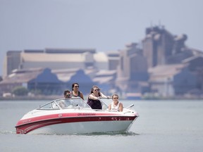 Boaters enjoy the sun on the Detroit River in LaSalle on July 4, 2019. Police and conservation authorities are asked boaters to slow down as high water levels and wakes from vessels are eroding shoreline property.