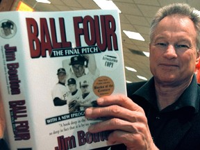 In this Nov. 27, 2000, file photo, former New York Yankees pitcher Jim Bouton signs copies of his book, "Ball Four: The Final Pitch" in a Waldenbooks store in Schaumburg, Ill.
