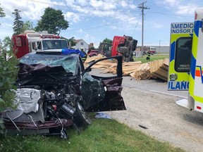 A photo showing the aftermath of a collision between an SUV and a transport truck in Leamington on the morning of July 2, 2019.