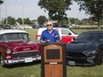 Tecumseh mayor, Gary McNamara, speaks at a press event announcing the second annual Cream of the Crop car show for the 2019 Corn Festival, at Lacasse Park, Monday, July 29, 2019.