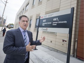 Calling for an investigation. MP Brian Masse (NDP—Windsor West) is shown July 4, 2019, outside the recently renovated federal government building at 441 University Ave. W., currently locked up pending a probe into whether the downtown structure remains safe for workers.