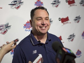 Windsor Spitfires' general manager Bill Bowler was all smiles after Wednesday's OHL Draft lottery.