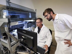 Big funding boost for freshwater fish research. Trevor Pitcher, left, a University of Windsor associate professor and researcher at the Great Lakes Institute for Environmental Research, and masters student Ryland Corchis-Scott are shown in a lab at GLIER on July 24, 2019.