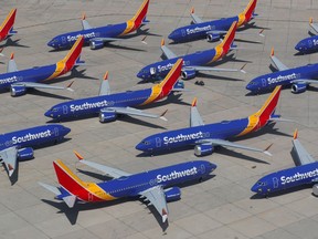 FILE PHOTO: A number of grounded Southwest Airlines Boeing 737 MAX 8 aircraft are shown parked at Victorville Airport in Victorville, California, U.S., March 26, 2019.