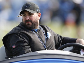 Detroit Lions head coach Matt Patricia drives in a golf cart with a foot injury during training camp at the Detroit Lions Training Facility.