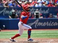 Blue Jays shortstop Freddy Galvis hits his second home run of the game in the third inning against the Royals at Rogers Centre in Toronto on Canada Day, Monday, July 1, 2019.