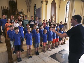 A boys' choir from northern France, led by conductor Jerome Cupelli, gives a preview performance July 26, 2019, at the Ste. Anne's Catholic Church in Tecumseh ahead of a free public performance Saturday night.