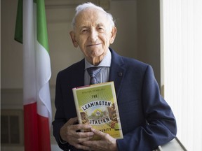 Victor Paglione, the only living original member of the Italian Historical Committee in Leamington, holds the new released book, The Leamington Italian Community: Ethnicity and Identity in Canada, written by Walter Temelini, while at the Roma Club, Tuesday, July 2, 2019.