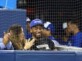 Kawhi Leonard of the Toronto Raptors watches a MLB game between the Los Angeles Angels of Anaheim and the Toronto Blue Jays at Rogers Centre on June 20, 2019 in Toronto, Canada.
