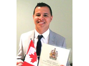 Free Press reporter Jonathan Juha receives his Canadian Citizenship at a ceremony on Canada Day July 1, 2019 in London, Ont. (Sebastian Bron/The London Free Press)