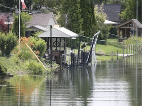 City council on Monday night approved spending up to $250,000 on a survey of "obstructions" built along a stretch of the Little River. The current high water levels on Little River are shown here on Monday, July 8, 2019.