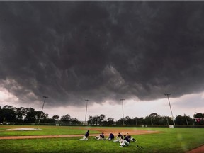 Dark skies no more. New lighting is coming to Cullen Stadium field in Mic Mac Park. In this Aug. 6, 2018, file photo, members of the Tecumseh Thunder baseball team are shown at the field as threatening storm clouds roll in.