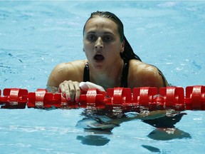 Swimming - 18th FINA World Swimming Championships - Women's 100m Backstroke Final - Nambu University Municipal Aquatics Center, Gwangju, South Korea - July 23, 2019. Kylie Masse of Canada reacts after race. REUTERS/Stefan Wermuth