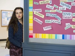 This image released by Netflix shows Katherine Langford in a scene from the series, "13 Reasons Why," about a teenager who commits suicide.