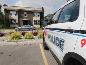 A Windsor police vehicle posted at a fourplex at 1093-1099 Pelissier St. following a fire on July 3, 2019. The matter is being investigated as an arson.