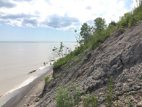 A sloping bluff leads down to Lake Erie off Talbot Trail near Coatsworth Road. Chatham-Kent officials are comcerned erosion impacting the high bluffs on along Talbot Trail could be undermining the roadway. JAKE ROMPHF, Postmedia News.