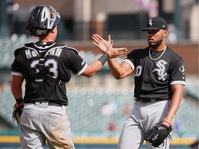 Jimmy Cordero #60 of the Chicago White Sox celebrates a 8-1 win over the Detroit Tigers with James McCann #33 at Comerica Park on August 07, 2019 in Detroit, Michigan.