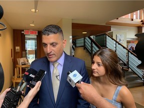 Eddie Francis and daughter Sienna talk about wife Michelle Prince at an event highlighting Prince's work to improve the cancer journey for patients at Windsor Regional Cancer Centre. Prince was posthumously honoured with a Human Touch Award from Cancer Care Ontario. These awards are presented annually to recognize individuals who go the extra mile to make a lasting impact in the lives of patients and their families.