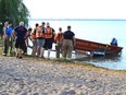 A LaSalle Fire and Rescue boat goes in the water at Lakewood Park in Tecumseh to assist with a search for a missing boater on Lake St. Clair on Saturday.