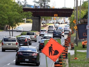 Construction pylons and signs signal the start next week of construction on the 2500 block of Dougall Avenue known as the Dougall "death trap."