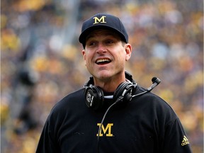 Head coach Jim Harbaugh of the Michigan Wolverines reacts on the sidlines during the first quarter of the college football game against the Michigan State Spartans at Michigan Stadium on October 17, 2015 in Ann Arbor, Michigan.