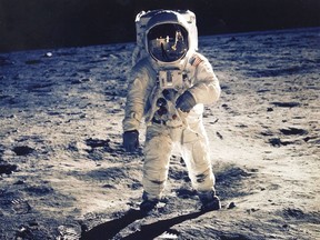 FILE: Astronaut Edwin E. Aldrin Jr., Lunar Module Pilot, Is Photographed Walking Near The Lunar Module During The Apollo 11 Extravehicular Activity. Man's First Landing On The Moon Occurred Today At 4:17 P.M. July 20, 1969 As Lunar Module "Eagle" Touched Down Gently On The Sea Of Tranquility On The East Side Of The Moon. The Lm (Lunar Module) Landed On The Moon On July 20, 1969 And Returned To The Command Module On July 21. The Command Module Left Lunar Orbit On July 22 And Returned To Earth On July 24, 1969. Apollo 11 Splashed Down In The Pacific Ocean On 24 July 1969 At 12:50:35 P.M. Edt After A Mission Elapsed Time Of 195 Hrs, 18 Mins, 35 Secs.