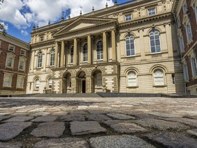 Osgoode Hall in downtown Toronto shown with its cobblestone walkway.